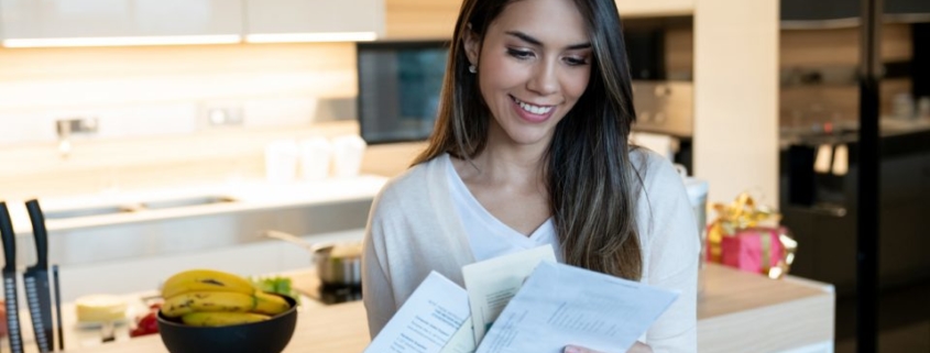 Woman reading direct mail